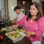 Woman and boy preparing dinner