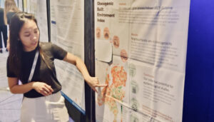 Thao Lam - 2023 EASO ECN Winter School Best Poster Winner shows off her poster