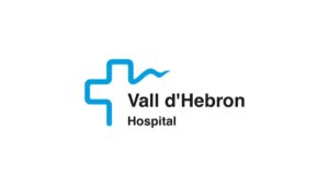 Vall d'Hebron Hospital logo featuring a stylized blue cross and wavy line to the upper right.